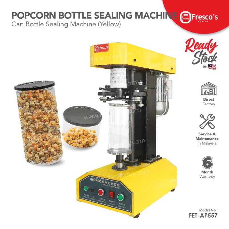 Pop Corn Can Bottle Sealing Machine Yellow FET-AP557 seals a popcorn-filled bottle, with another sealed bottle nearby; product features and warranty details are clearly displayed.