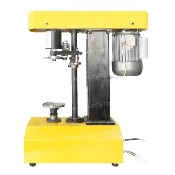 The Pop Corn Can Bottle Sealing Machine Yellow FET-AP557 features a right-side motor, central vertical support, and base platform for cans; perfect for sealing popcorn cans.