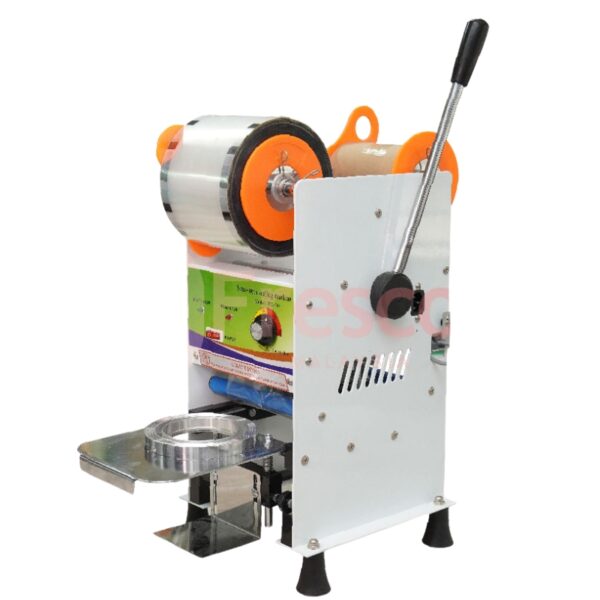The Semi Auto Cup Sealing Machine FET-B7 features a hand lever, sealing film rollers, and a sturdy metal tray for cups—perfect for efficient tabletop operation.