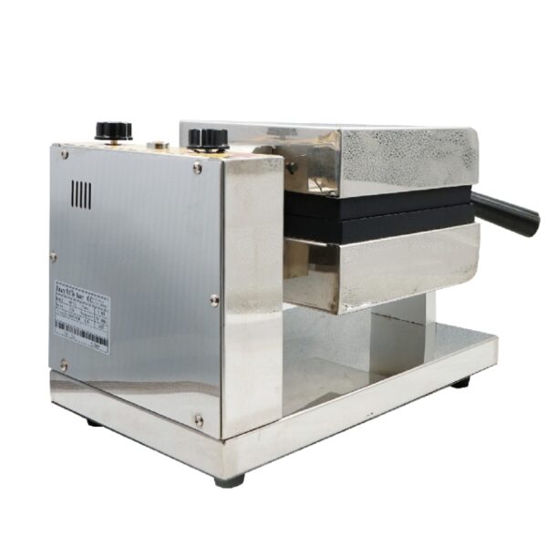A Waffle Water Tear Electric Machine FNP-73, made of stainless steel with black handle and control knobs, shown from the side and slightly behind.
