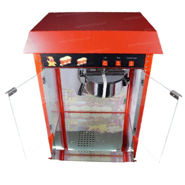 The Popcorn Machine Electric Commercial with Roof Top FET-POP6A has glass doors, a metal kettle, and user-friendly control switches on the front panel.