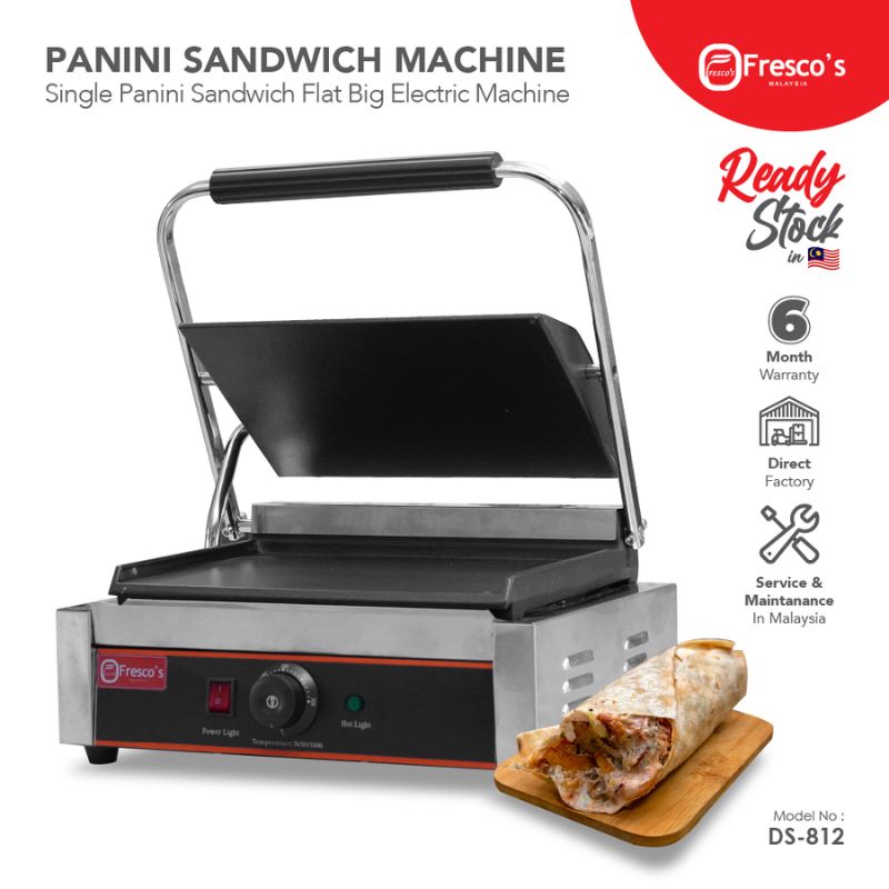 The Commercial Grill Panini Sandwich Big Flat Single Electric Machine, model DS-812, is displayed with its lid open, revealing a tempting burrito on a wooden board. Text highlights include "Fresco's," "6 Month Warranty," and "Service & Maintenance in Malaysia.