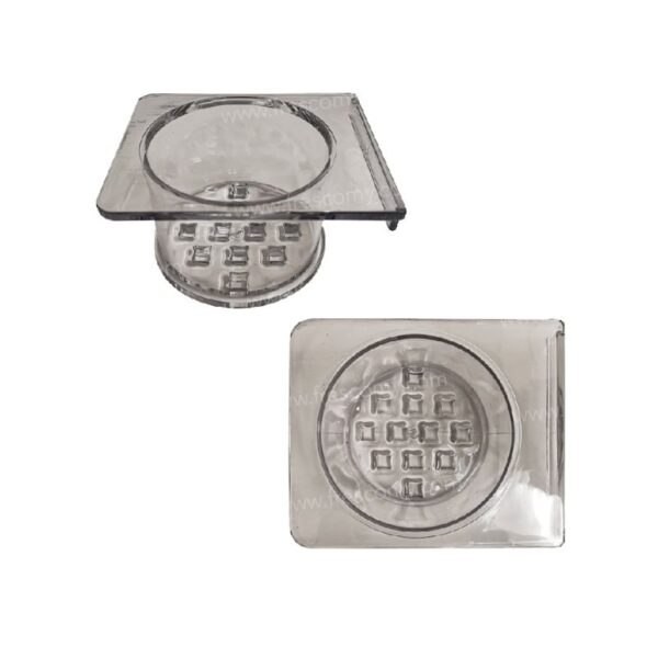 Two clear, square plastic objects with circular grid patterns resembling intricate components of the Long Potato Forming Machine 12 Holes, viewed from various angles.