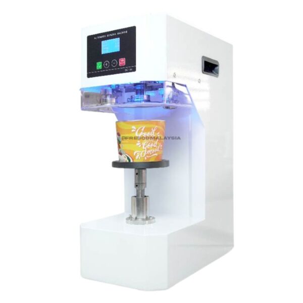 The Fully Auto Cup Sealing Machine Drink Packaging Sealer FWY-680, with a digital display, expertly seals a cup labeled "Good Food" under soothing blue light—an ideal drink packaging solution.