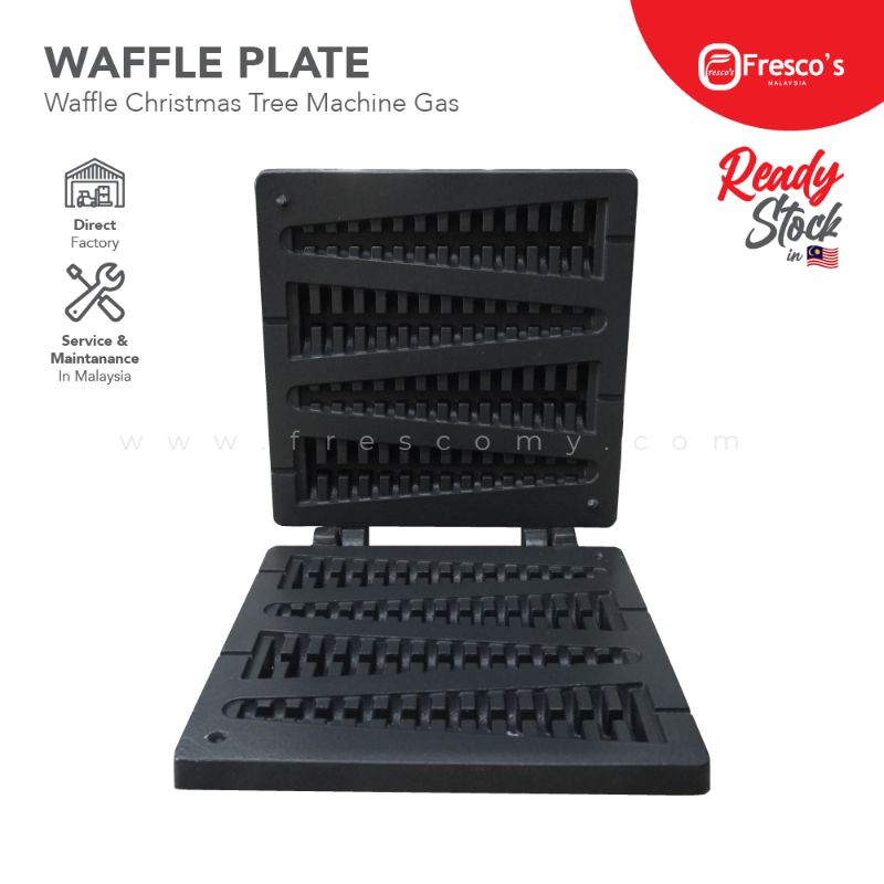 The Waffle Plate Christmas Tree Mould Spare Part Mold features a ridged black interior, designed for gas waffle machines to create festive Christmas tree-shaped waffles. The open mold displays its detailed design.