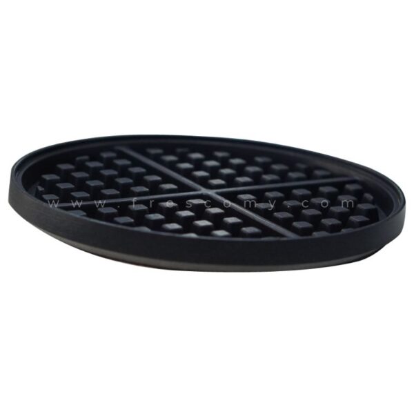 The Waffle Round Plate Mould Waffle Spare Part is a black circular rubber plate with a grid of raised bumps and four dividing lines, shown from a side angle on a white background.