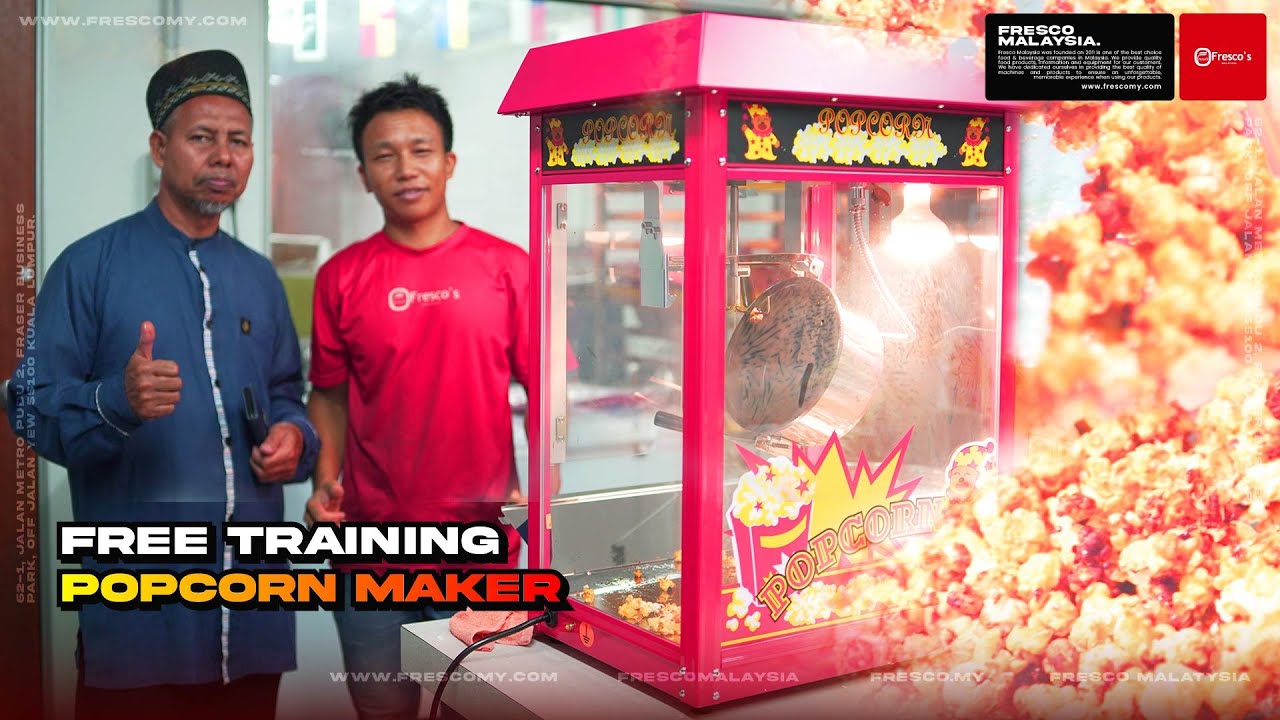 Two men stand beside a Fresco popcorn maker, with a large popcorn graphic in the foreground and text advertising free training on how to make popcorn machine.